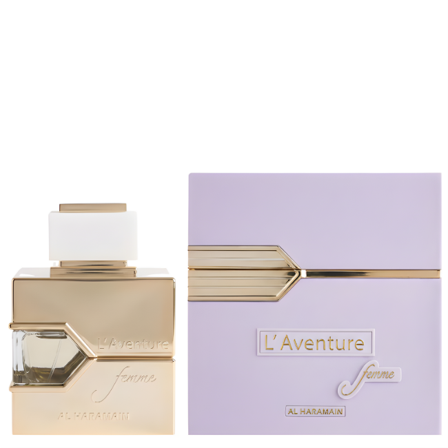 Al Haramain L’Aventure Femme 100ml Eau De Parfum in its signature gold cube-shaped bottle, displayed next to a large lavender-lilac square presentation box with a matching gold geometric accent.