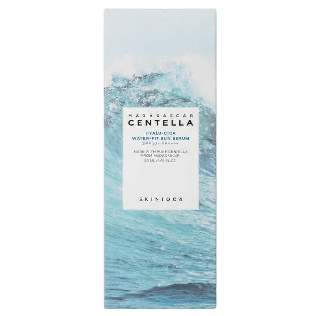 Minimalist white rectangular box for SKIN1004 Madagascar Centella Hyalu-Cica Water-Fit Sun Serum, featuring a high-definition photograph of a crashing blue ocean wave.