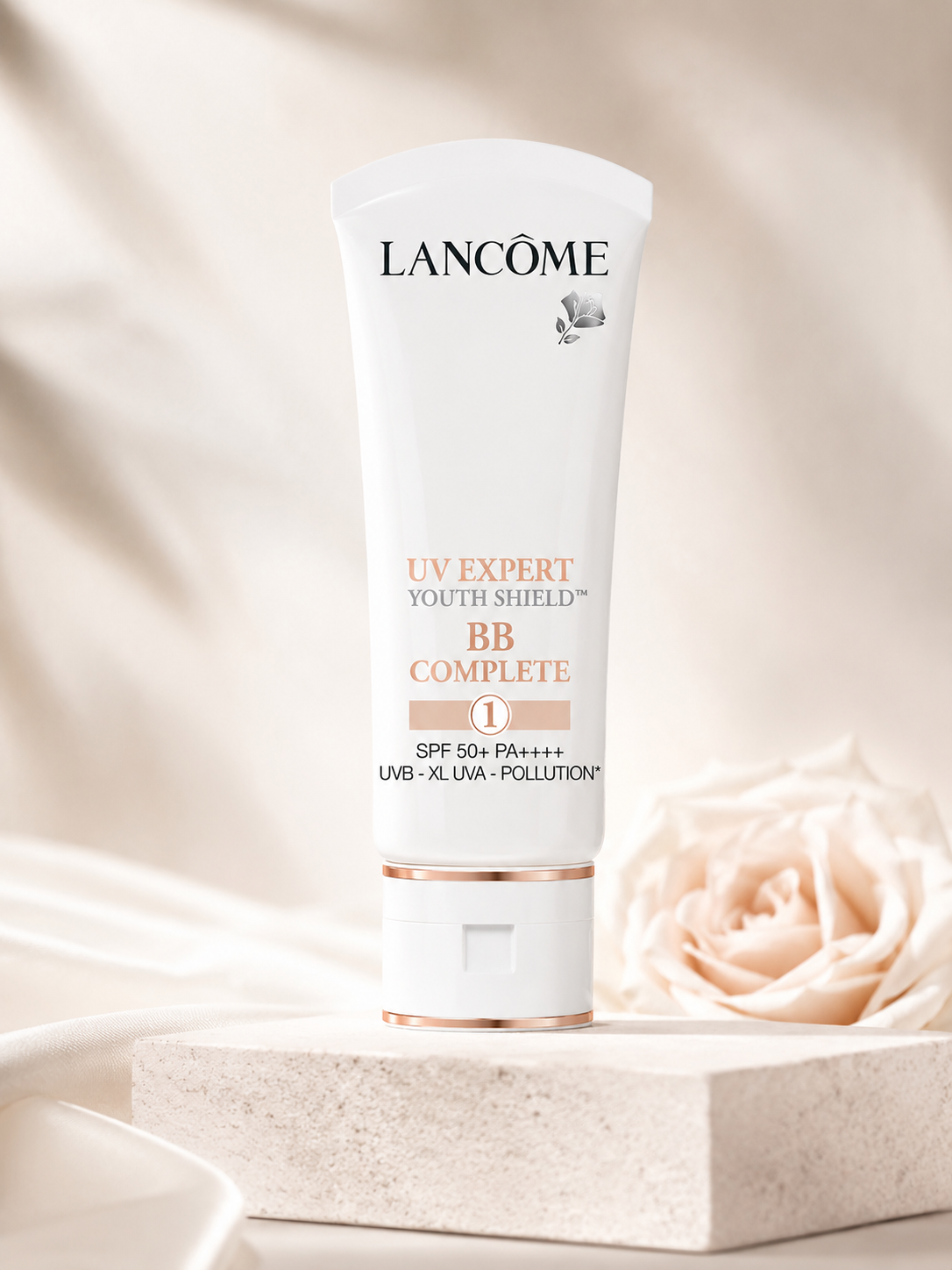 Lancôme UV Expert BB Complete C1 SPF50 PA++++ 50ml bottle is presented in a refined setting.