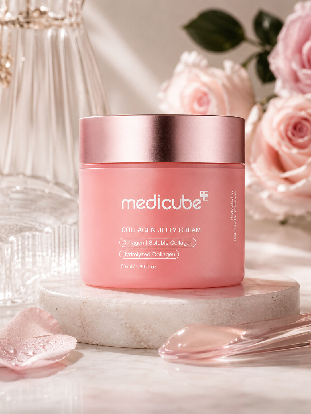 Medicube Collagen Jelly Cream 50ml with pink roses in the background
